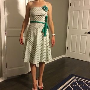 Strapless polka dot cotton stretch dress with rose